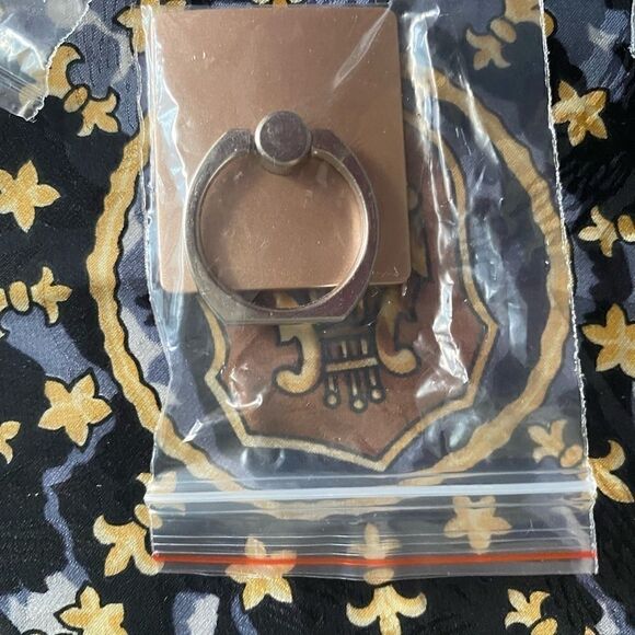 Cell phone rings & hooks bundle. Comes with several stick ons for hangers. - Picture 4 of 4